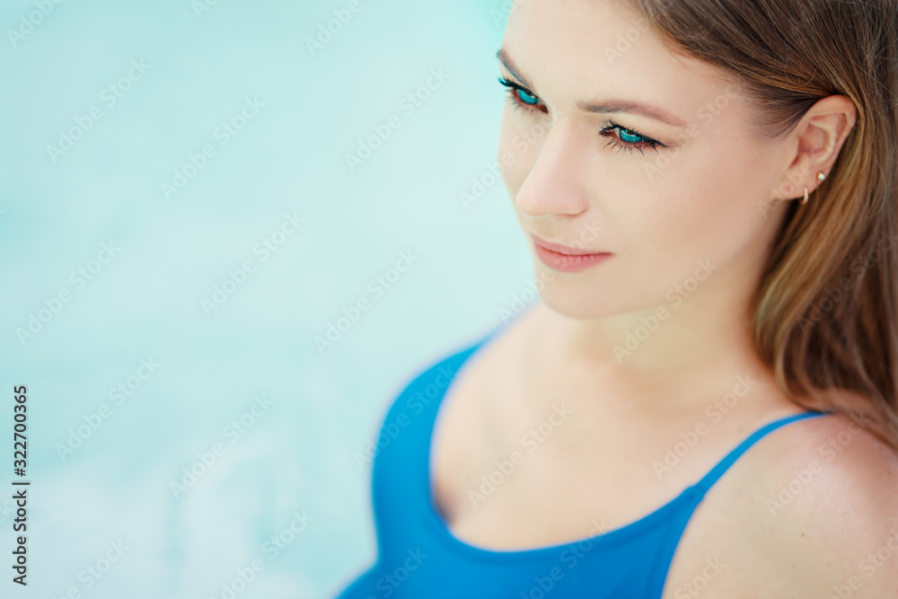 Enjoying vacation. Beautiful young woman in swimming pool. Enjoying vacation. Beautiful young woman in swimming pool.