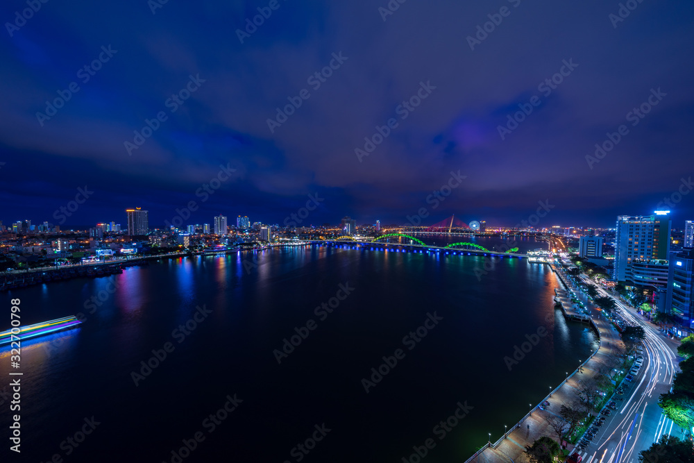 Fototapeta premium Nightscape of Da Nang city with dragon bridge, Vietnam