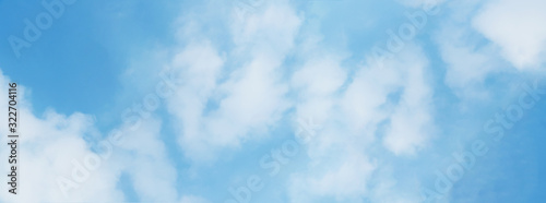 Blue sky with white fluffy clouds for background, panorama view