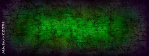 Green grunge background with violet frame. Abstract color art vintage background. Toned texture of old wood. Web banner. Wide. Panoramic. For design. Horror, fantasy, mystery, portal.