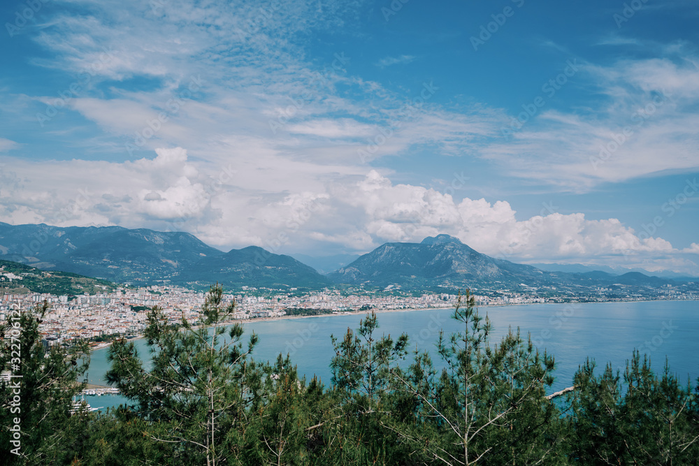 Beautiful view of Alanya city with mountains and sea bay.