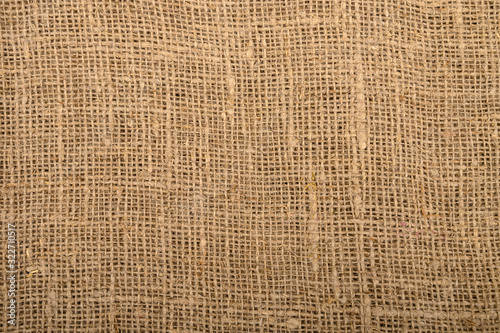 Texture of coarse homespun fabric. Background image, Close-up.