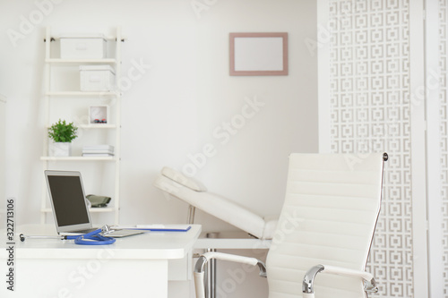 Doctor s workplace with modern laptop in medical office