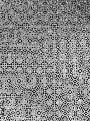 Distress grunge vector texture of fabric with snowflakes ornament, macrame, wickerwork, crochet, openwork.
