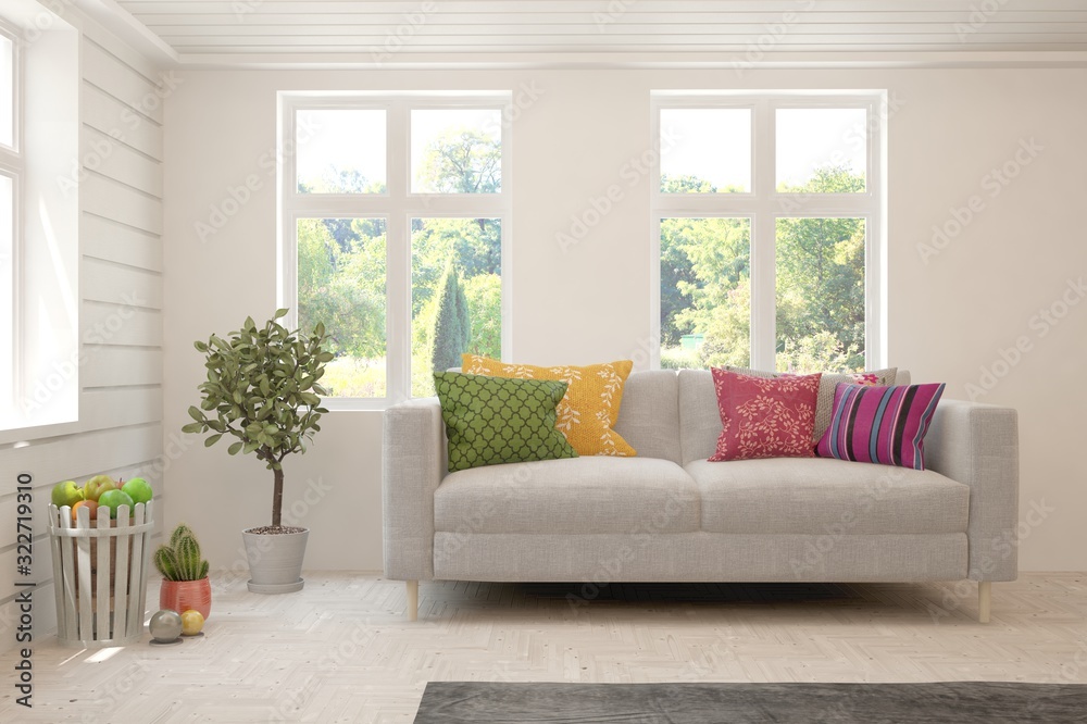 Fototapeta premium Stylish room in white color with sofa and summer landscape in window. Scandinavian interior design. 3D illustration