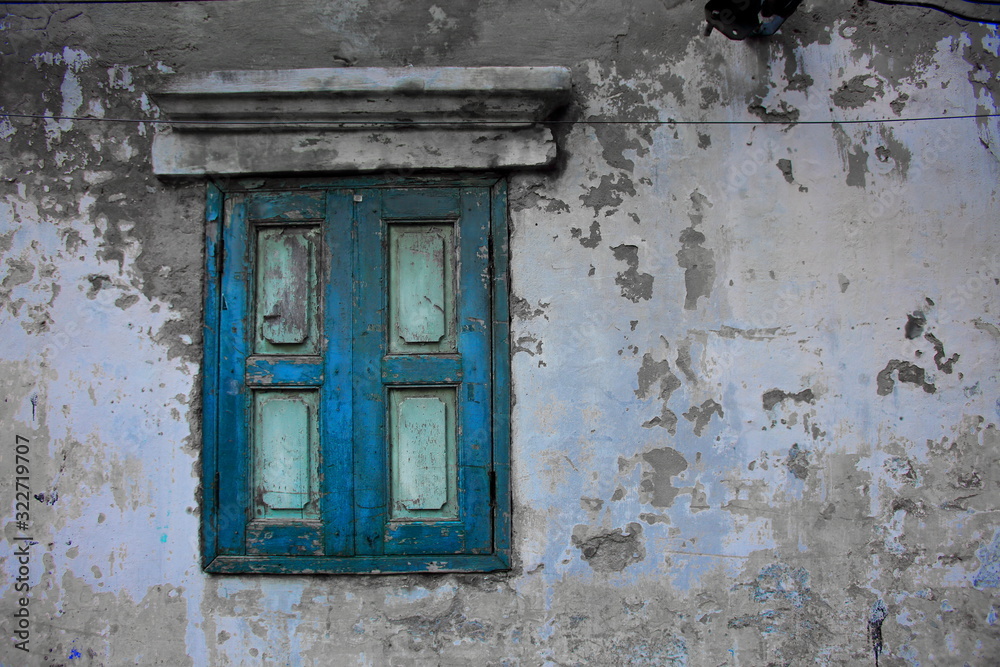 Windows and walls of old residences in Bangkok's Talat Noi area Windows and walls of old residences in Bangkok's Talat Noi area