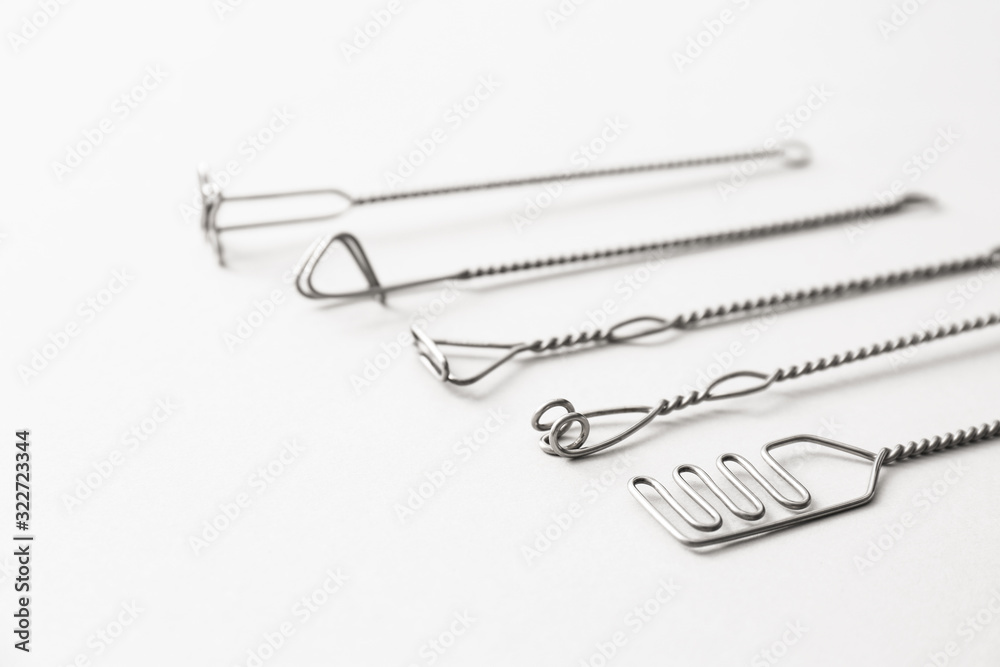 Set of logopedic probes for speech therapy on light grey background Set of logopedic probes for speech therapy on light grey background