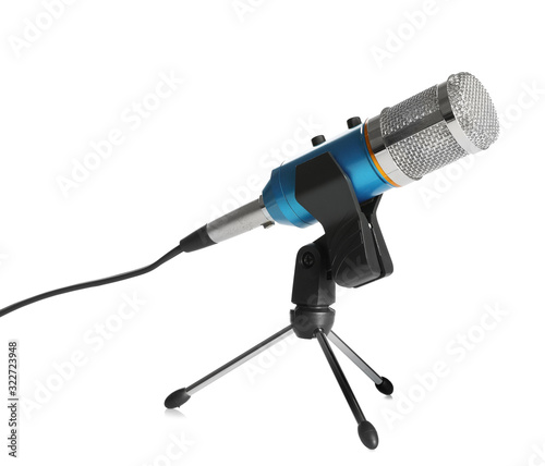 Modern microphone isolated on white. Journalist's equipment