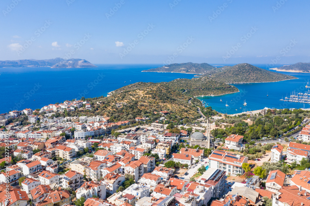 An aerial view of the bay of Kas in Antalya Turkey. Sea and town with an open sky.
