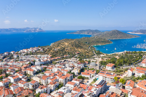 An aerial view of the bay of Kas in Antalya Turkey. Sea and town with an open sky.