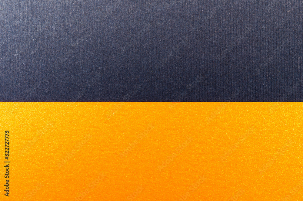 Blue and orange paper texture background. Place for text. Two tones. Background for presentation. Blue and orange paper texture background. Place for text. Two tones. Background for presentation.