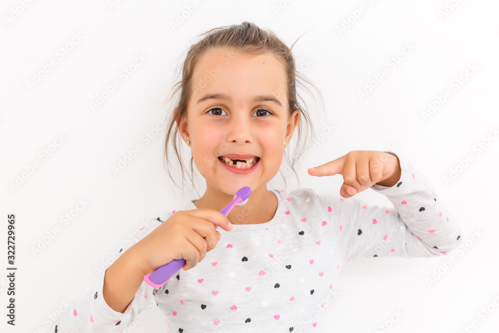 little girl shows a tooth baby toothbrush little girl shows a tooth baby toothbrush