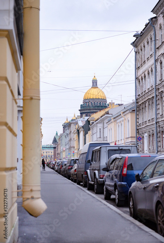 street in the center of St. Petersburg, buildings, cars, dome of St. Isaac's Cathedral