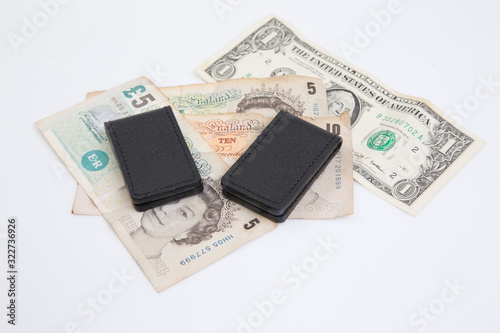 A leather money clip on the white background