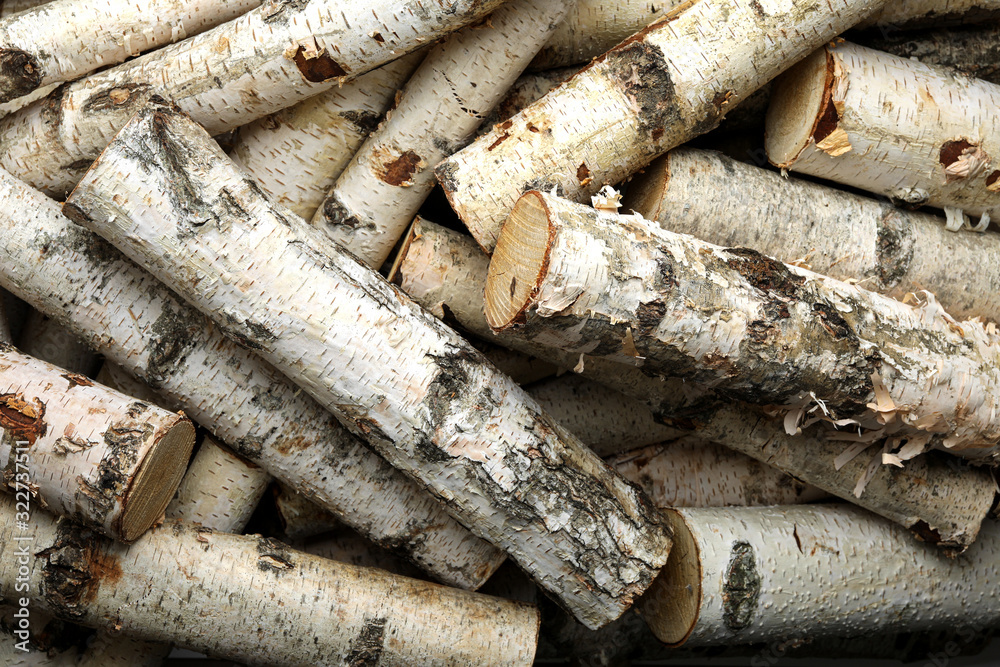 Cut firewood as background, top view. Heating in winter Cut firewood as background, top view. Heating in winter