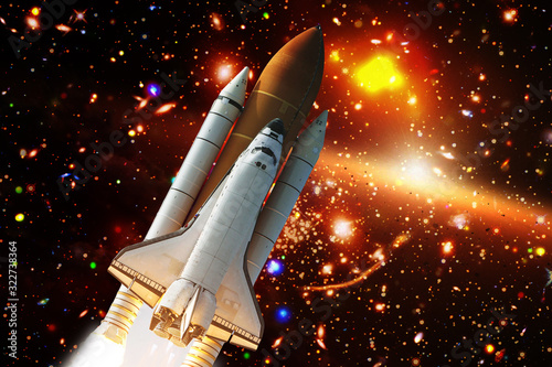 Rocket in the deep space. Galaxy and stars. The elements of this image furnished by NASA.