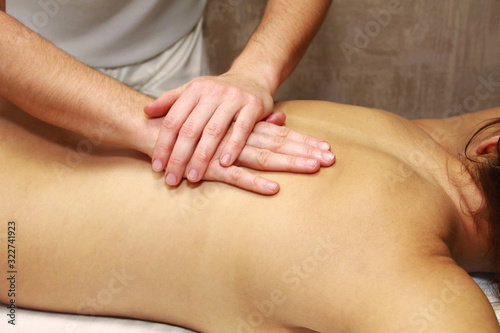 therapeutic back massage. Massage Therapy