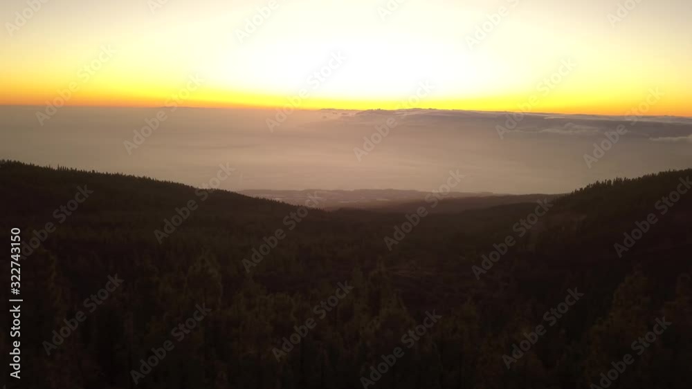 View from the mountains on the sunset and low floating clouds, 4k View from the mountains on the sunset and low floating clouds, 4k
