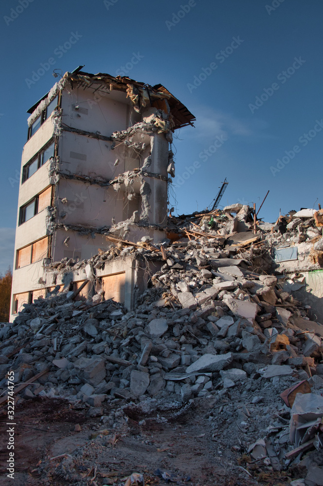 Dismantling a building. Dismantling a building.