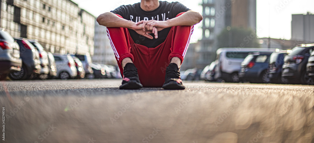 Teenager wearing a pair of Adidas Yeezy 350 Stock Photo | Adobe Stock