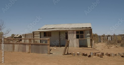 An old abandoned house in a ghost town in Outback Australia photo