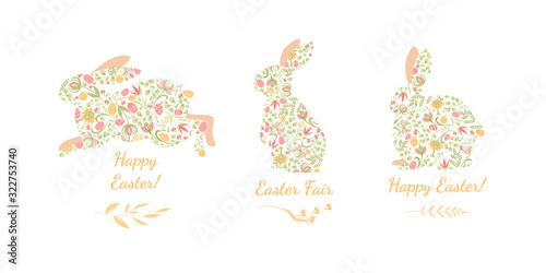 Set of Easter bunnies decorated with eggs and plants for the design of greeting cards and banners isolated on white background.