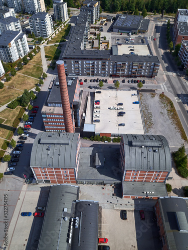 Aerial view of Sibelius Hall in Lahti, Finland. On the background new district. The old factory was rebuilt into housing. photo