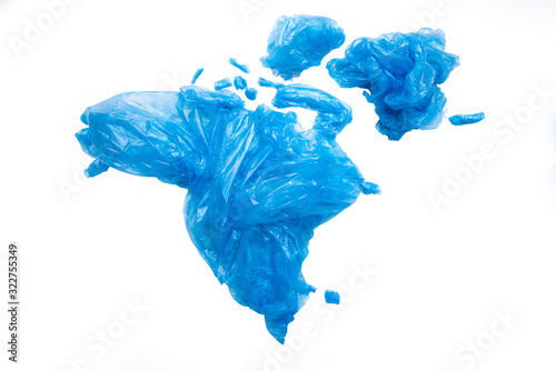 Global concept of plastic pollution. Map of North America with plastic bags for trash on the continent.