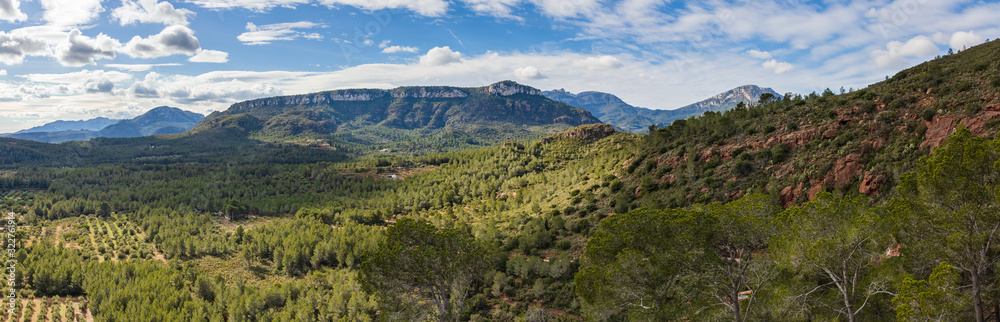 Great panorama of the mountains of the Natural Reserve of Lleberia from the Sanctuary of the Mare de Deu of Roca, Mont-roig, Catalonia, Spain Great panorama of the mountains of the Natural Reserve of Lleberia from the Sanctuary of the Mare de Deu of Roca, Mont-roig, Catalonia, Spain