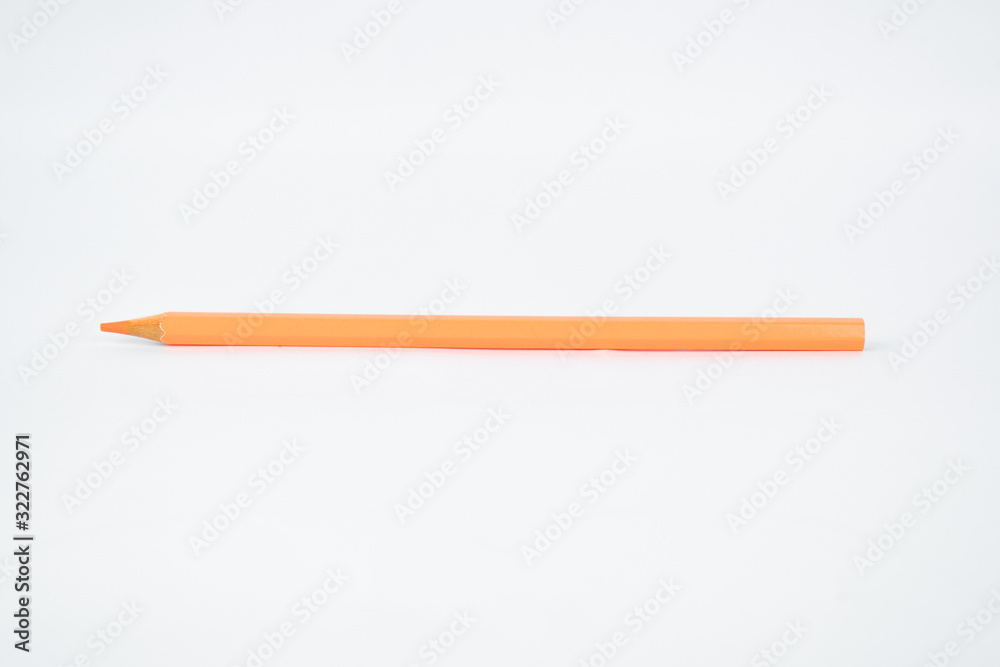 A light pink colored sharp wood pencil crayon isolated on a white background A light pink colored sharp wood pencil crayon isolated on a white background