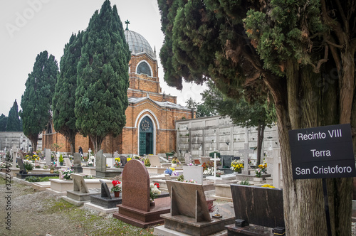 Fotografie Inside the cemetery of Venice, with small church. Italy, Europe.