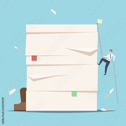 Businessmen climbing up a pile of documents