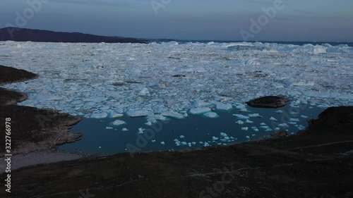 Greenland Ilulissat glaciers at ocean photo