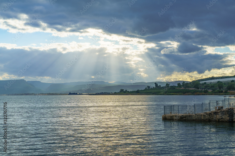 Sea of Galilee, with clouds and sun beams