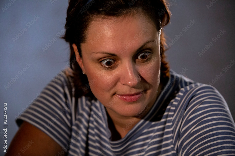 Fototapeta premium Portrait of a young woman in the interior.