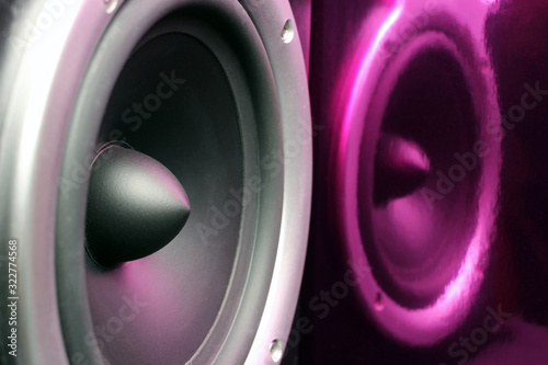 Slika na platnu Acoustic column, musical speaker with purple reflection. Close up