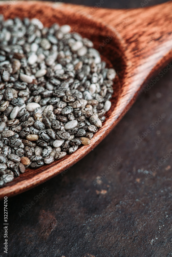 Chia seeds on the wooden table. Selective focus. shallow depth of field. Chia seeds on the wooden table. Selective focus. shallow depth of field.