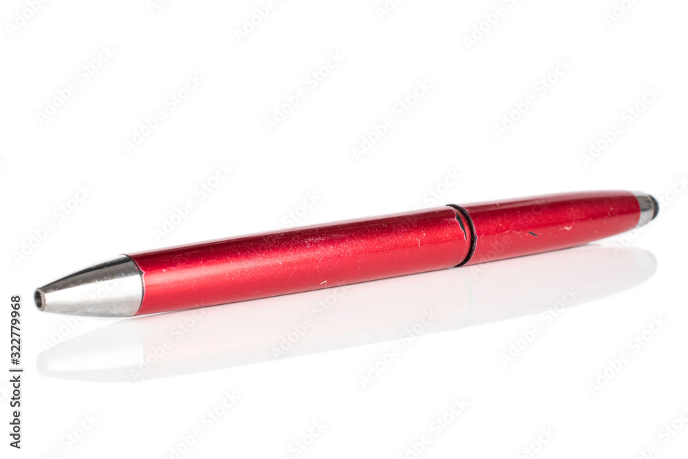 One whole red writing ballpoint pen isolated on white background One whole red writing ballpoint pen isolated on white background