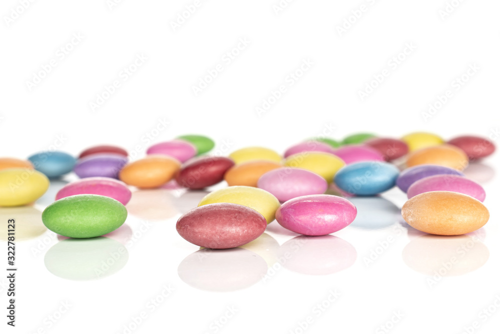 Lot of whole disordered sweet colourful candy isolated on white background Lot of whole disordered sweet colourful candy isolated on white background