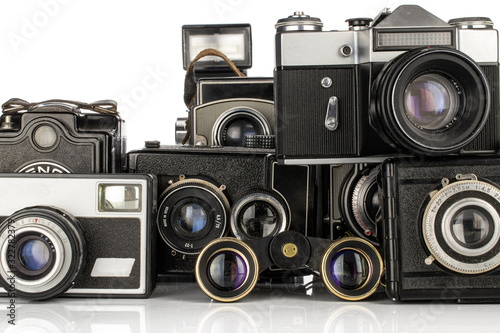 Lot of whole vintage camera isolated on white background