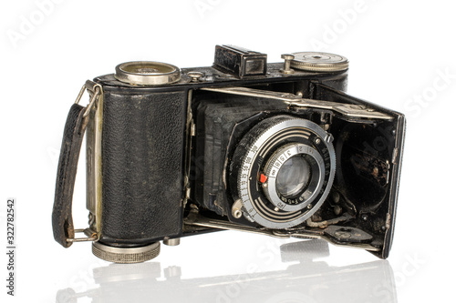One whole vintage camera isolated on white background photo