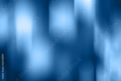 Different shades of classic blue blurred gradient background. Mixed motion texture. Abstract dark and light wallpaper © MariiaDemchenko