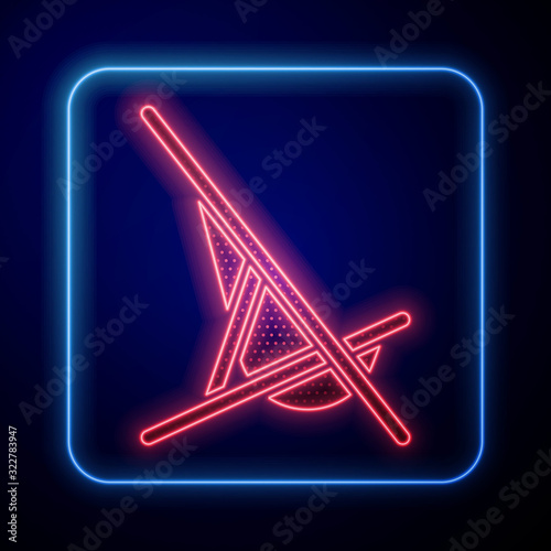 Glowing neon Sunbed icon isolated on blue background.  Vector Illustration