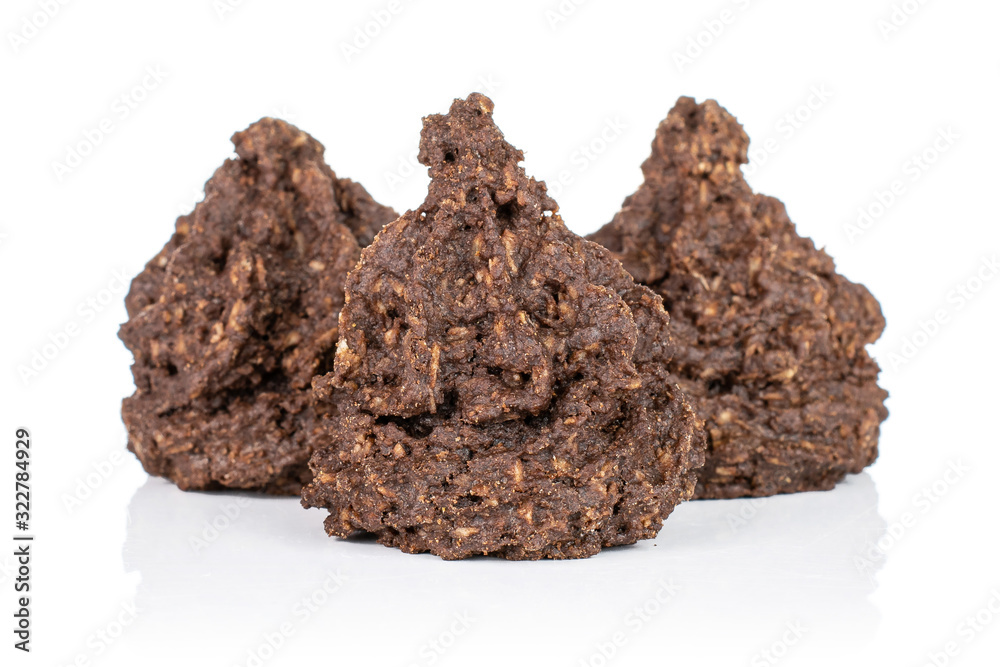 Group of three whole homemade brown coconut cocoa biscuit isolated on white background Group of three whole homemade brown coconut cocoa biscuit isolated on white background