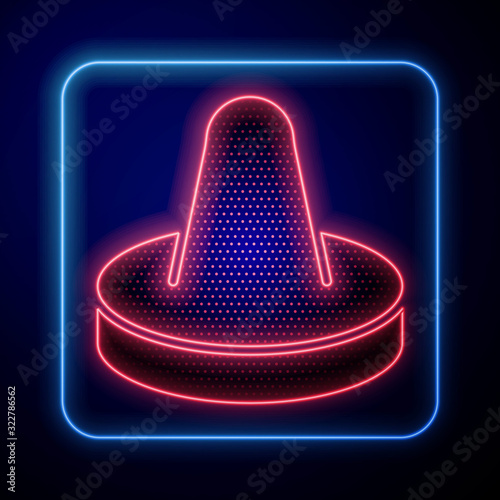 Glowing neon Mallet and puck for playing air hockey game icon isolated on blue background.  Vector Illustration