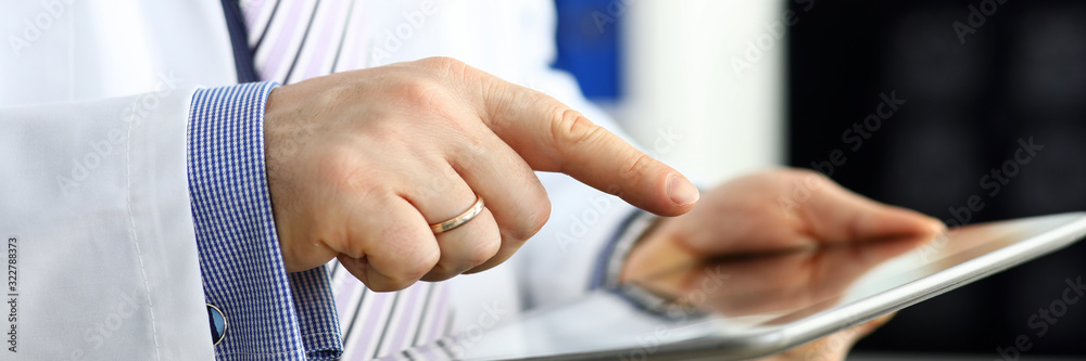 Male medicine doctor holding digital tablet pc