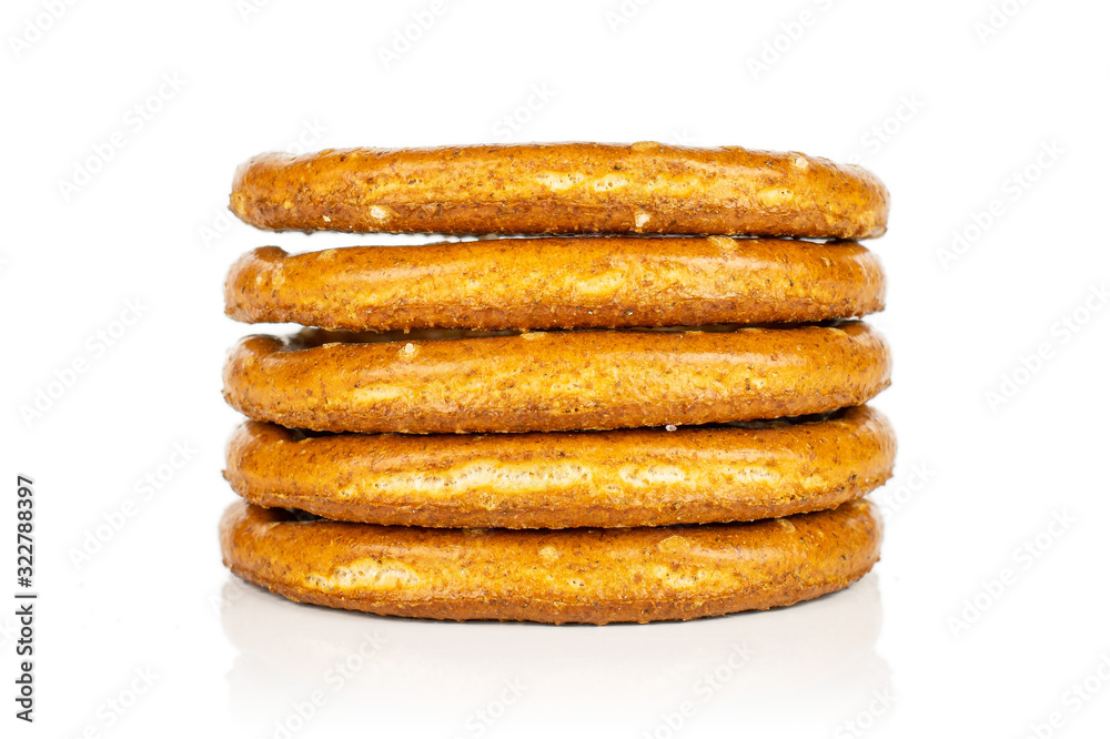 Group of five whole salty brown pretzel isolated on white background Group of five whole salty brown pretzel isolated on white background