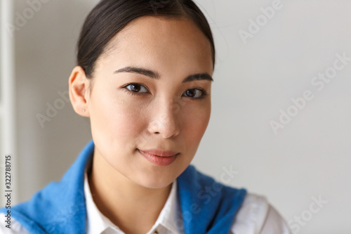 Close up of a pretty young asian businesswoman