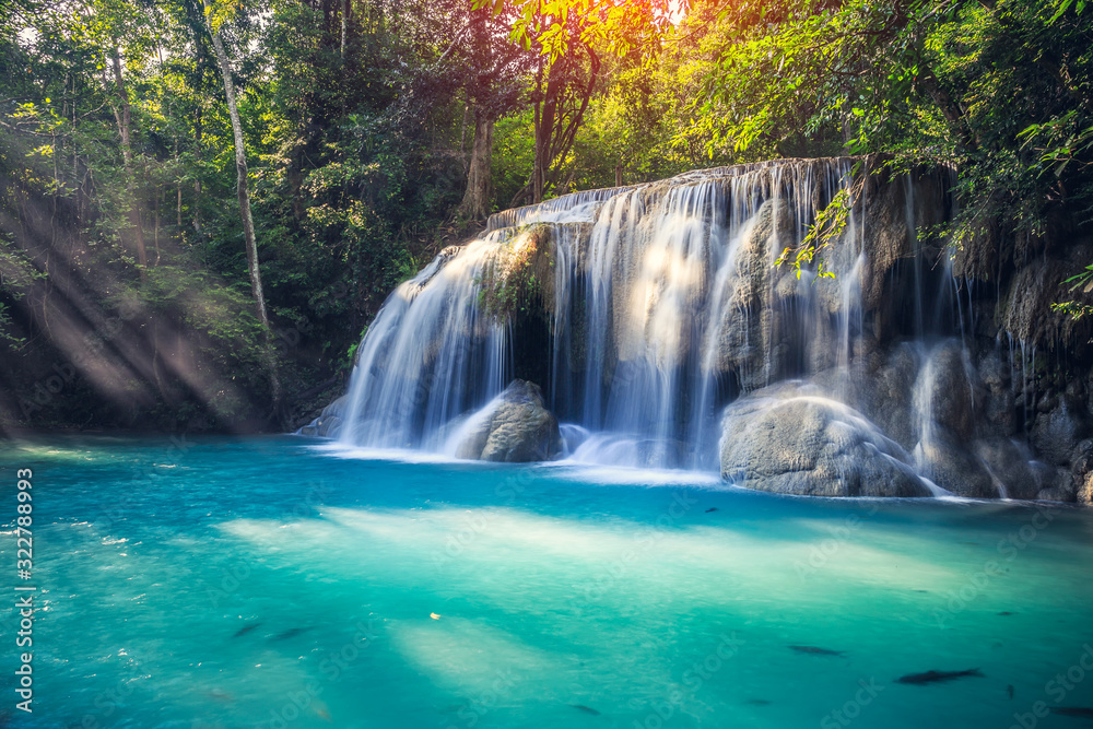 Waterfall, green forest in Erawan National Park, Thailand. Landscape with water flow, river, stream and rock at outdoor. Beautiful scenery of nature for tourist to tour, visit, relax in vacation. Waterfall, green forest in Erawan National Park, Thailand. Landscape with water flow, river, stream and rock at outdoor. Beautiful scenery of nature for tourist to tour, visit, relax in vacation.