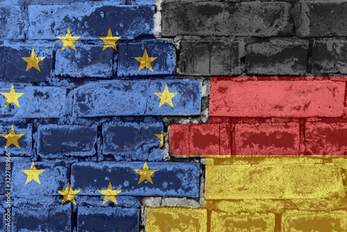 The flag of the European Union and Germany on a brick wall